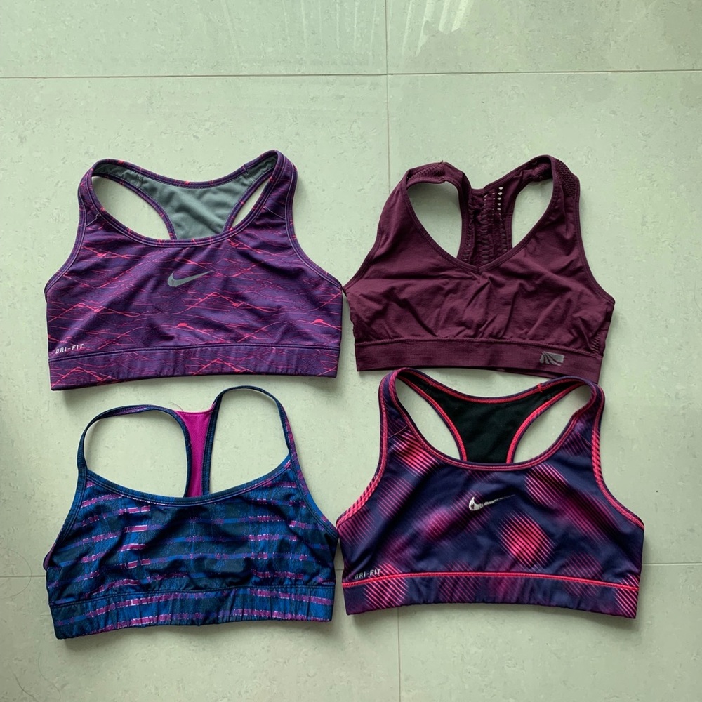 Four Nike/Target sports bras size M